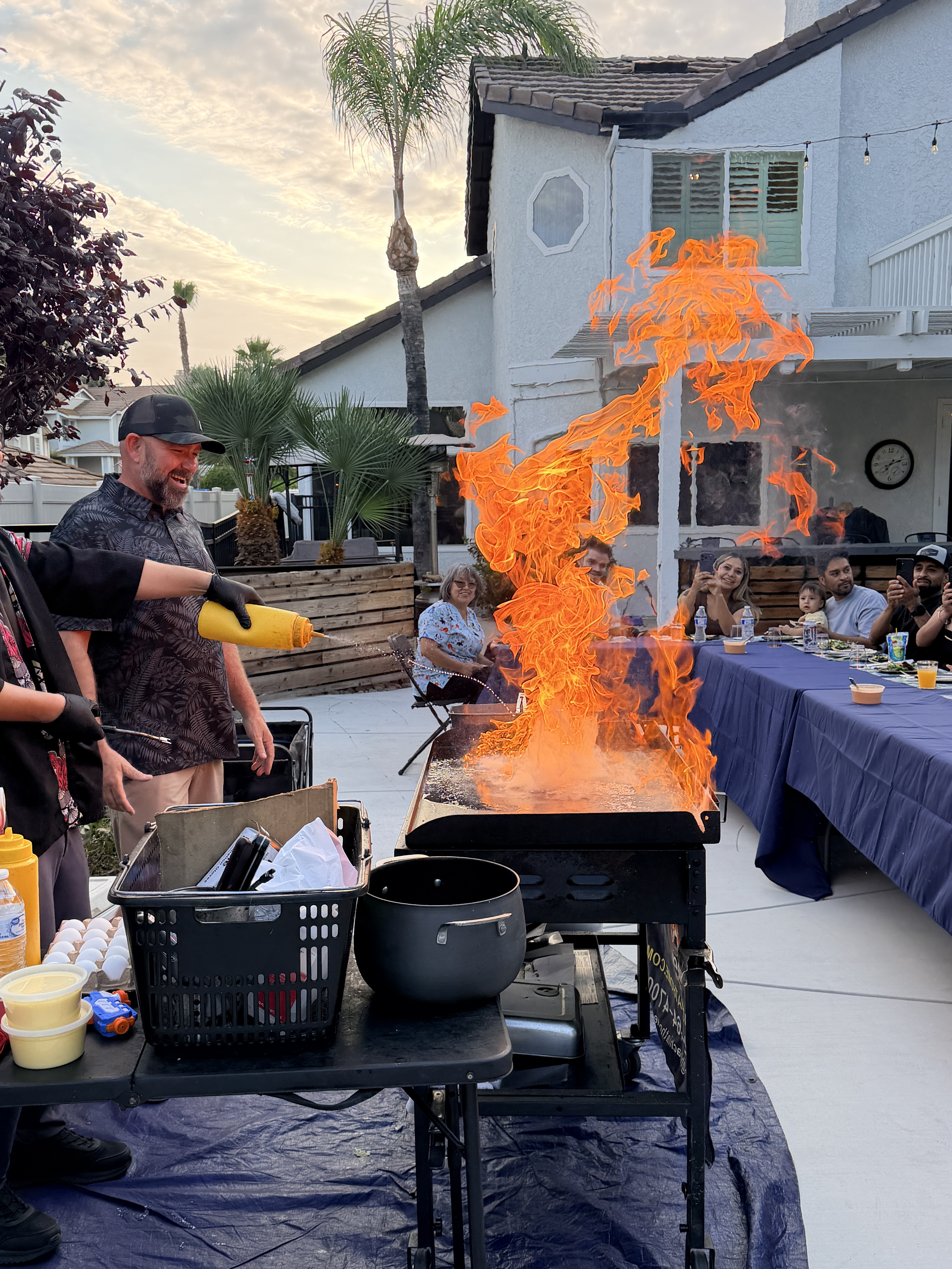Sunset hibachi flame show at a Southern California celebration