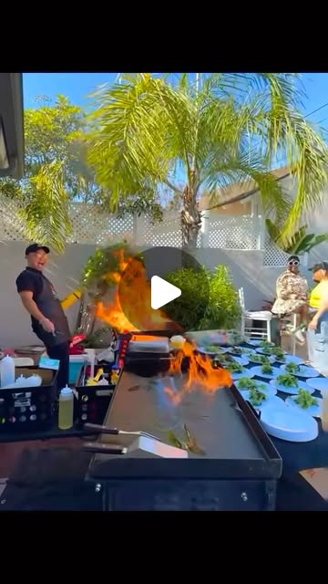 Chef demonstrating hibachi cooking techniques